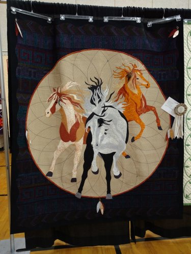 First Place:   Kris Vierra   “I Dream of Wild Horses”